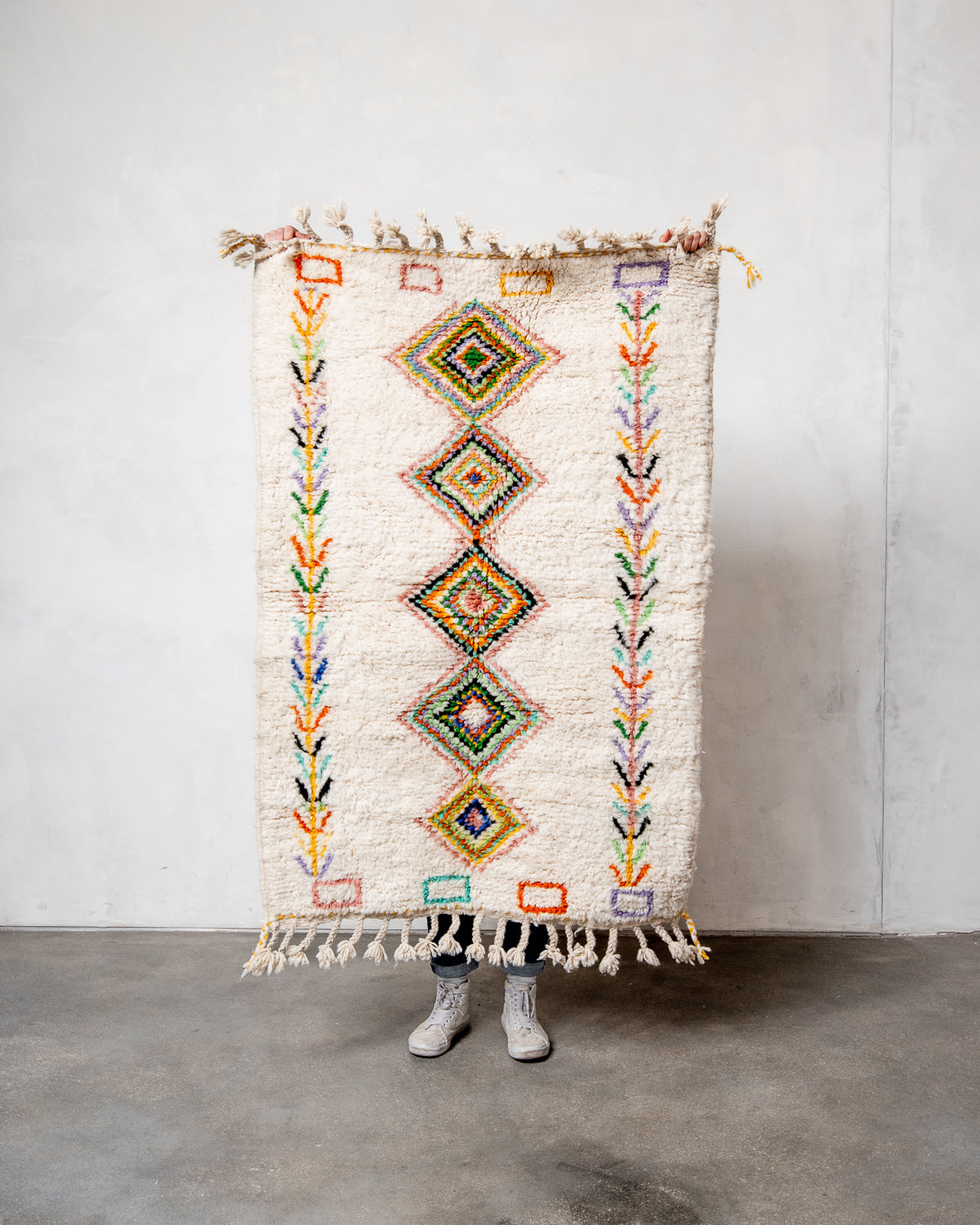 Modern, designer, handcrafted Berber rug from Morocco. Beniourain carpet with beautiful colours and patterns and fluffy wool texture.